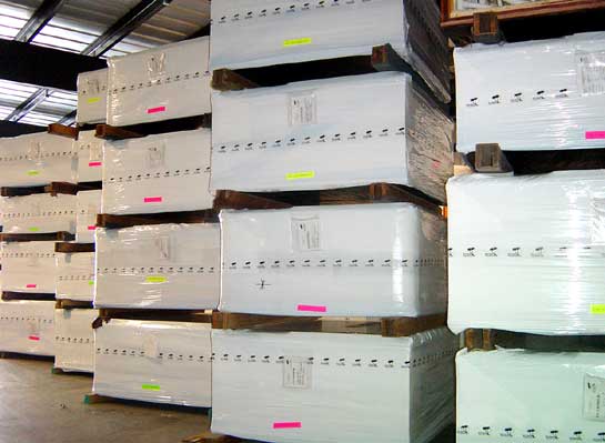 Warehoused spas, protectively wrapped